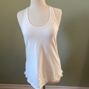 Lululemon tank top. Cream with ruffle. Size 10/12